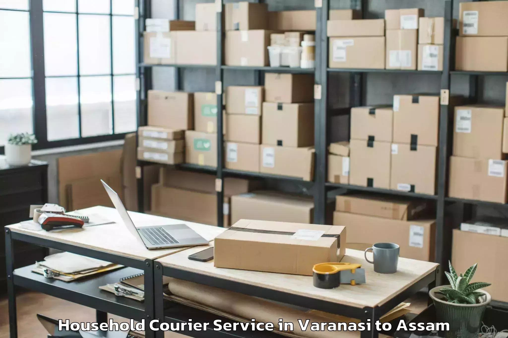 Trusted Varanasi to Numaligarh Household Courier